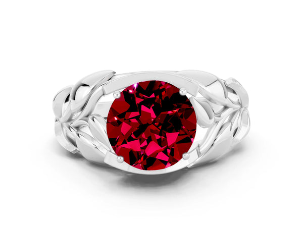 Platinum Round Cut Garnet Leaf-Inspired Engagement Ring with Round Accents and Prong Setting