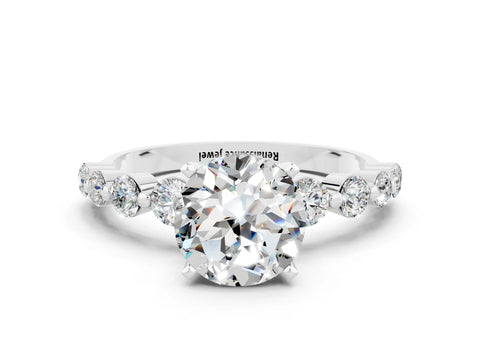 White gold Round Cut Solitaire Moissanite Ring with Pave Band and Four-Prong Setting