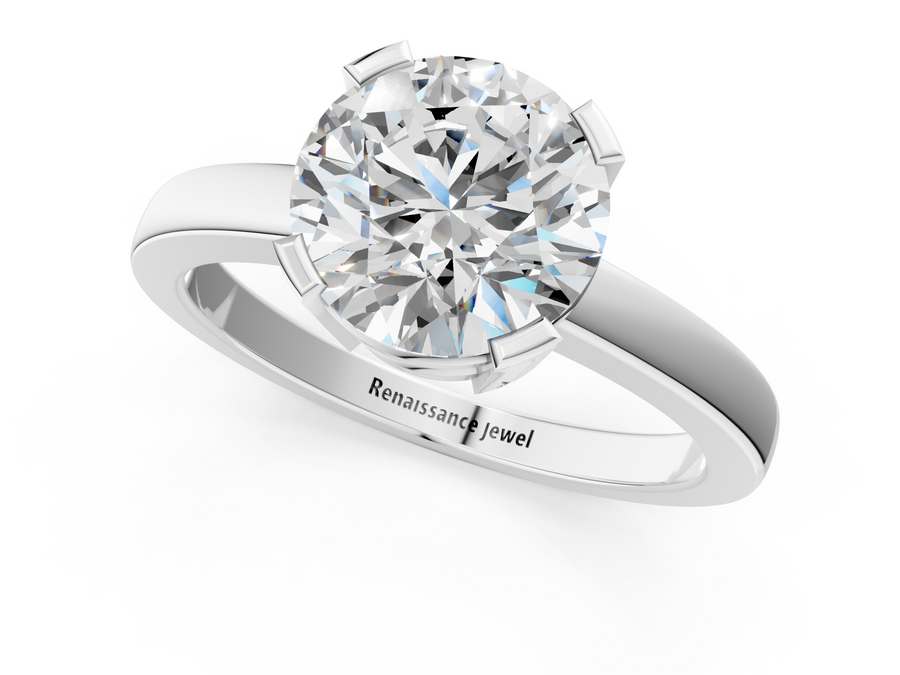 White gold Round Cut Solitaire Ring with Four-Prong Setting and Classic Band