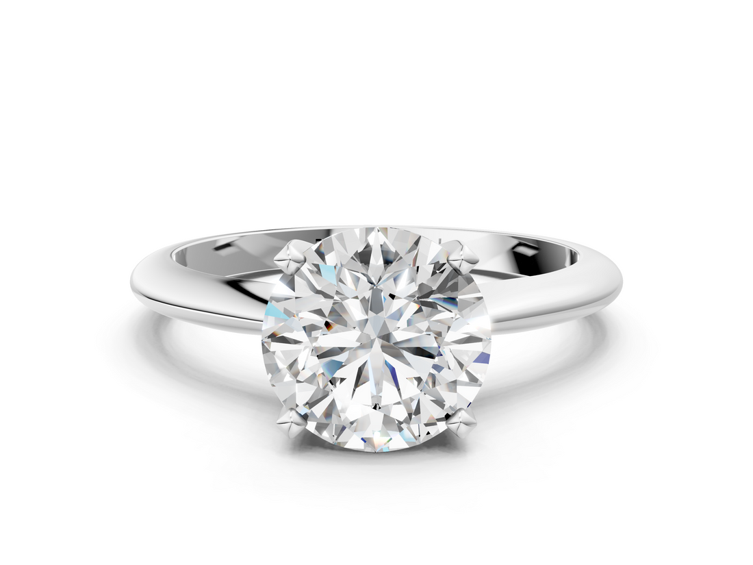White gold Round Cut Solitaire Ring with Four-Prong Setting on a Classic Band_109