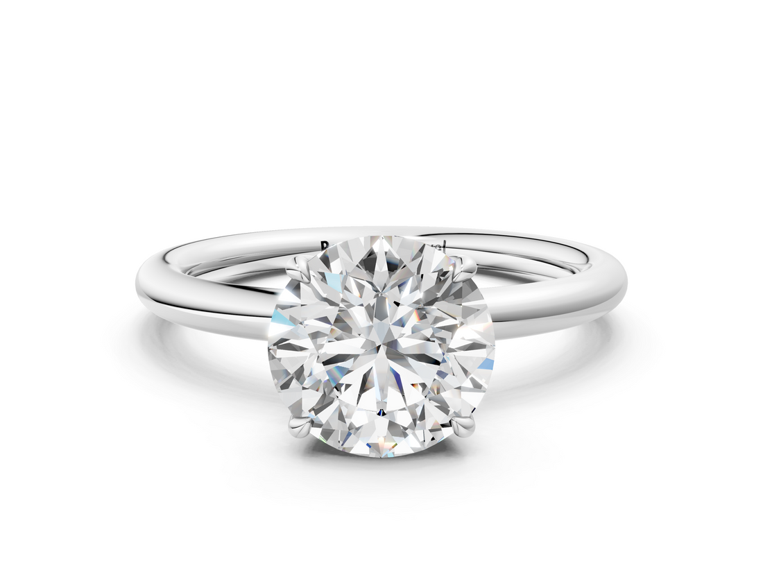 White gold Round Cut Solitaire Ring with Thin Band and Four-Prong Setting_49