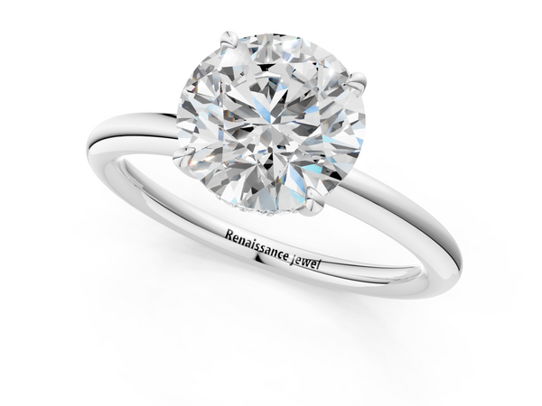 White gold Round Cut Diamond Solitaire Ring with Thin Band and Four-Prong Setting
