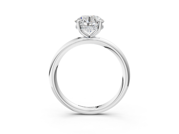 White gold Round Cut Diamond Solitaire Ring with Thin Band and Four-Prong Setting