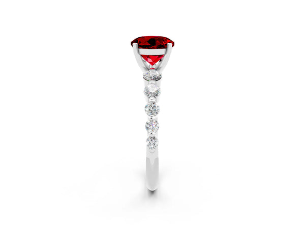 Silver Round Cut Solitaire Ruby Ring with Pave Band and Four-Prong Setting