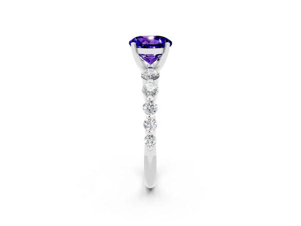 Silver Round Cut Solitaire Tanzanite Ring with Pave Band and Four-Prong Setting