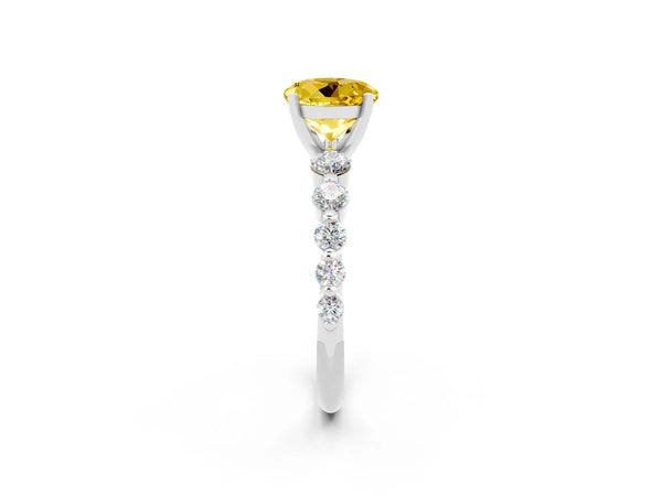 Silver Round Cut Solitaire Yellow Sapphire Ring with Pave Band and Four-Prong Setting