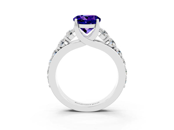 Platinum Round Cut Tanzanite Engagement Ring with Pavé Band and Four-Prong Setting