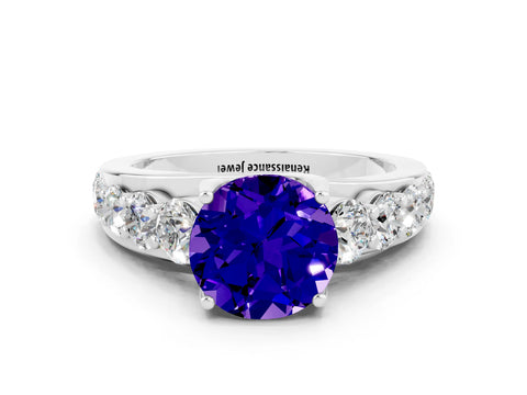White gold Round Cut Tanzanite Engagement Ring with Pavé Band and Four-Prong Setting