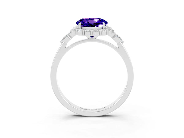 Platinum Round Cut Tanzanite Halo Ring with Pear Side Stones and Prong Setting