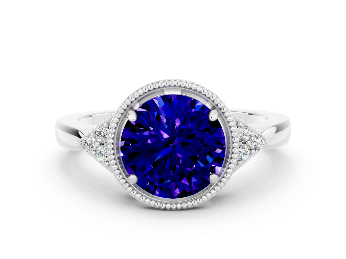 White gold Round Cut Tanzanite Halo Ring with Tapered Band and Four-Prong Setting