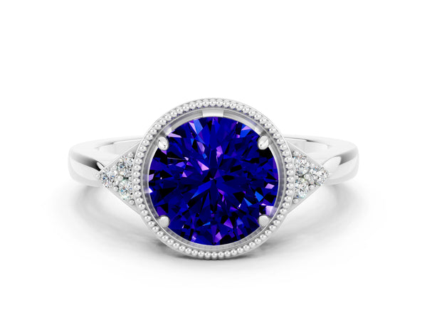 Platinum Round Cut Tanzanite Halo Ring with Tapered Band and Four-Prong Setting