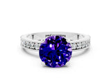 White gold Round Cut Tanzanite Milgrain Pavé Engagement Ring with Four-Prong Setting