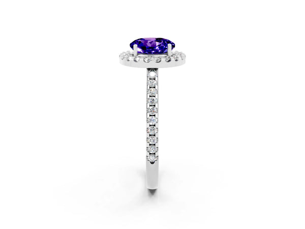 Platinum Round Cut Tanzanite Pavé Halo Ring with Four-Prong Setting