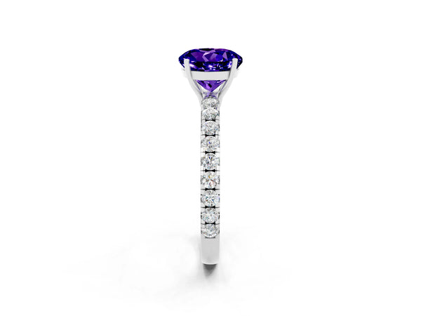 Platinum Round Cut Tanzanite Pavé Solitaire Engagement Ring with Four-Prong Setting