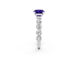 White gold Round Cut Tanzanite Prong Setting with Side Stones on a Pave Band_2