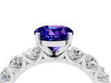 White gold Round Cut Tanzanite Prong Setting with Side Stones on a Pave Band_4