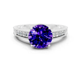 White gold Round Cut Tanzanite Ring with Milgrain Pavé Band and Four-Prong Setting_12