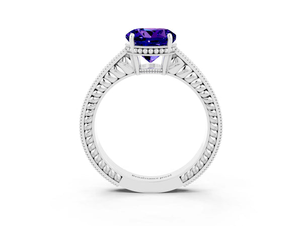 Platinum Round Cut Tanzanite Ring with Milgrain Pavé Band and Four-Prong Setting