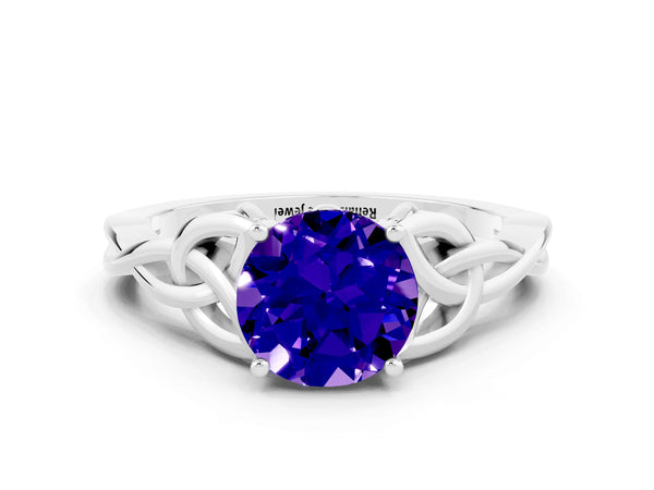 Platinum Round Cut Tanzanite Solitaire Celtic Knot Ring with Four-Prong Setting