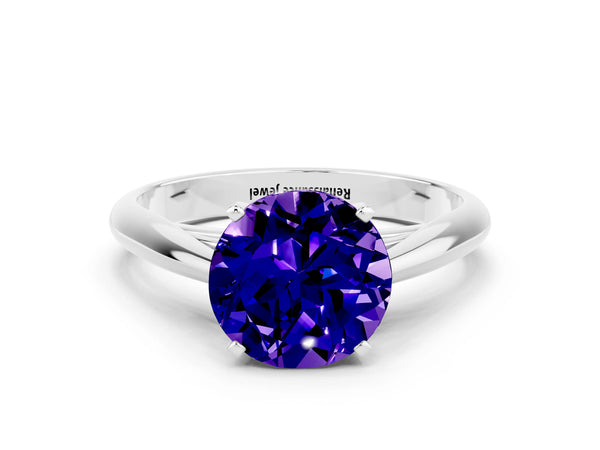 Platinum Round Cut Tanzanite Solitaire Engagement Ring with Cathedral Setting and Four-Prong Mount