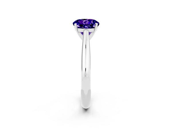Silver Round Cut Tanzanite Solitaire Engagement Ring with Cathedral Setting and Four-Prong Mount