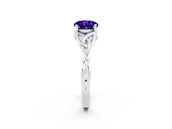 Platinum Round Cut Tanzanite Solitaire Engagement Ring with Celtic Knot Band and Four-Prong Setting