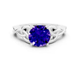 White gold Round Cut Tanzanite Solitaire Engagement Ring with Celtic Knot Band and Four-Prong Setting