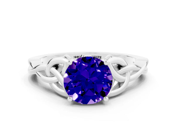 Silver Round Cut Tanzanite Solitaire Engagement Ring with Celtic Knot Band and Four-Prong Setting