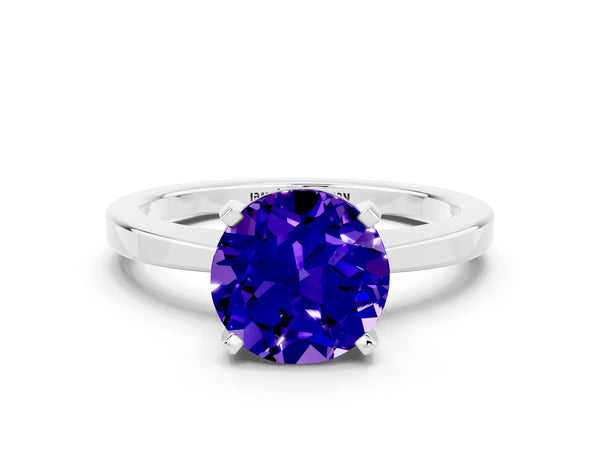Platinum Round Cut Tanzanite Solitaire Engagement Ring with Classic Band and Four-Prong Setting