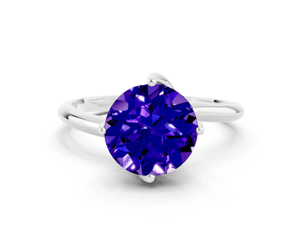 Silver Round Cut Tanzanite Solitaire Engagement Ring with Four-Prong Setting and Classic Band
