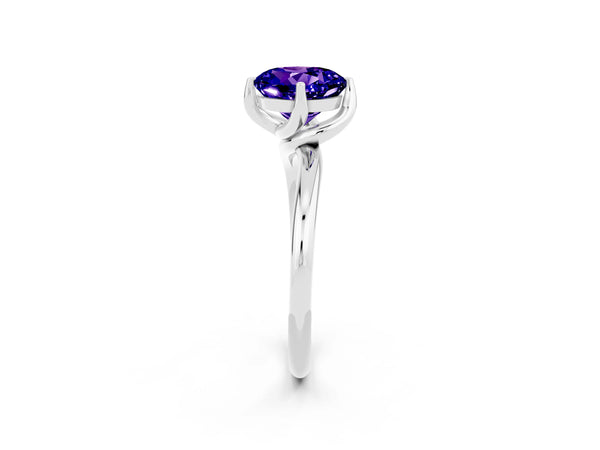 Silver Round Cut Tanzanite Solitaire Engagement Ring with Four-Prong Setting and Classic Band