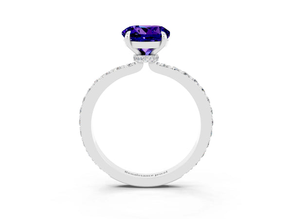 Platinum Round Cut Tanzanite Solitaire Engagement Ring with Pavé Band and Four-Prong Setting