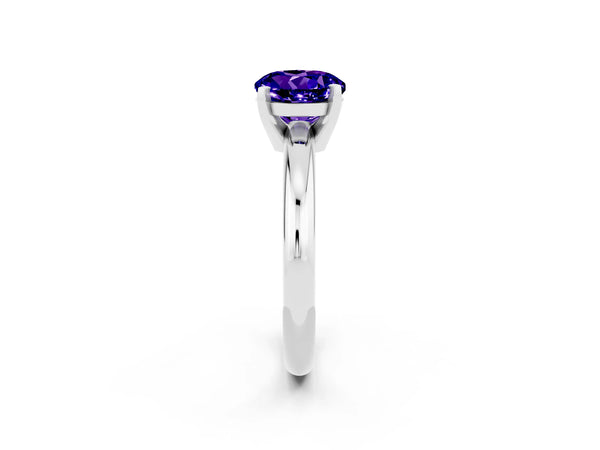 Silver Round Cut Tanzanite Solitaire Engagement Ring with Round Band and Four-Prong Setting