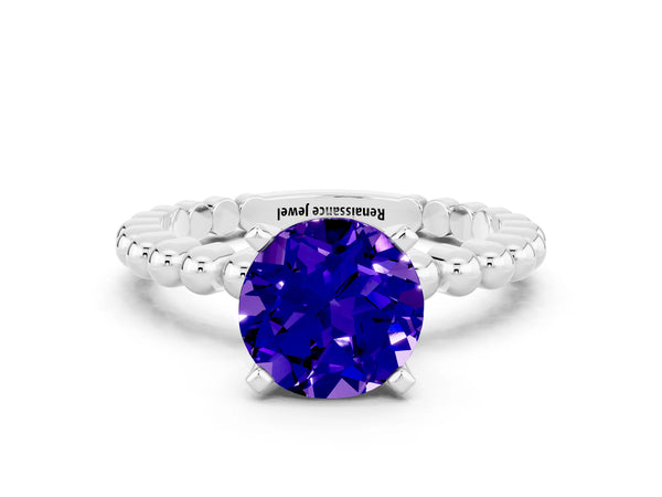 Platinum Round Cut Tanzanite Solitaire Ring with Beaded Band and Prong Setting