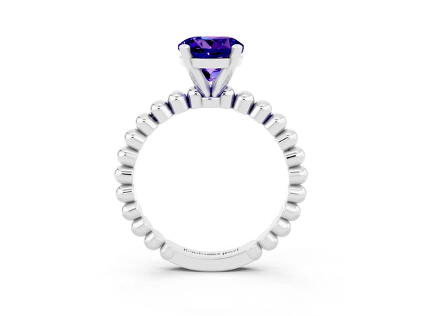 Platinum Round Cut Tanzanite Solitaire Ring with Beaded Band and Prong Setting