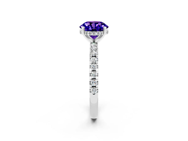 Platinum Round Cut Tanzanite Solitaire Ring with Round  Pavé Band and Four-Prong Setting