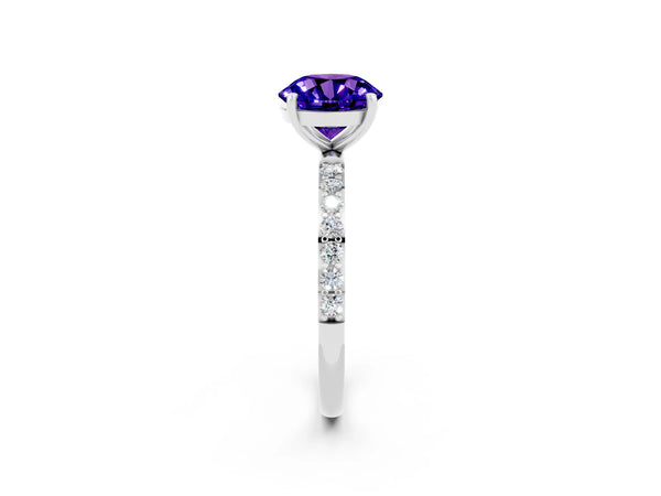 Platinum Round Cut Tanzanite Solitaire Ring with Round  Pavé Band and Prong Setting
