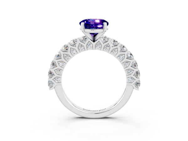 Silver Round Cut Tanzanite Solitaire Ring with Shared Prong Pavé Band and Four-Prong Setting