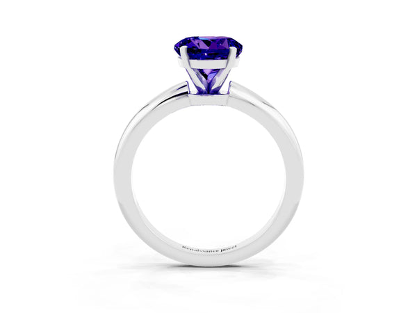 Silver Round Cut Tanzanite Solitaire Ring with Six-Prong Setting and Classic Band