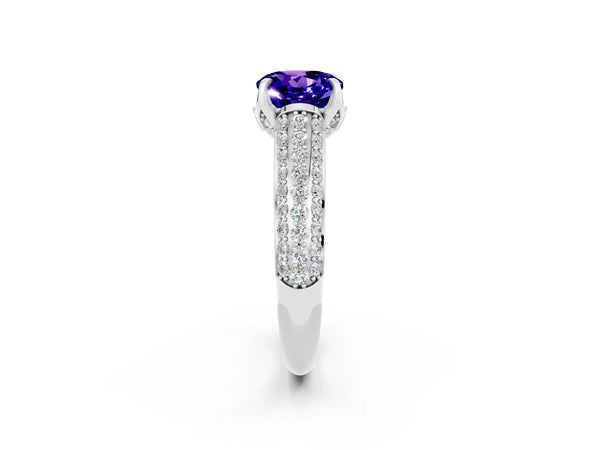 Silver Round Cut Tanzanite Solitaire Ring with Three-Row Pavé Band and Four-Prong Setting
