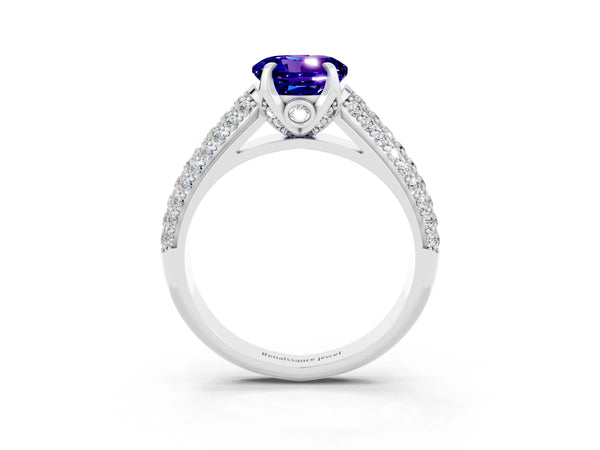 Platinum Round Cut Tanzanite Solitaire Ring with Three-Row Pavé Band and Four-Prong Setting