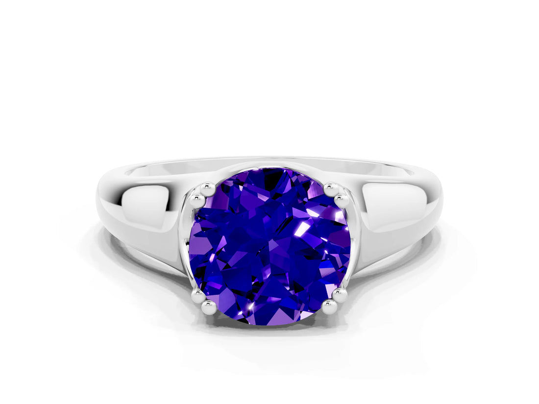 White gold Round Cut Tanzanite Solitaire Ring with Wide Band and Prong Setting