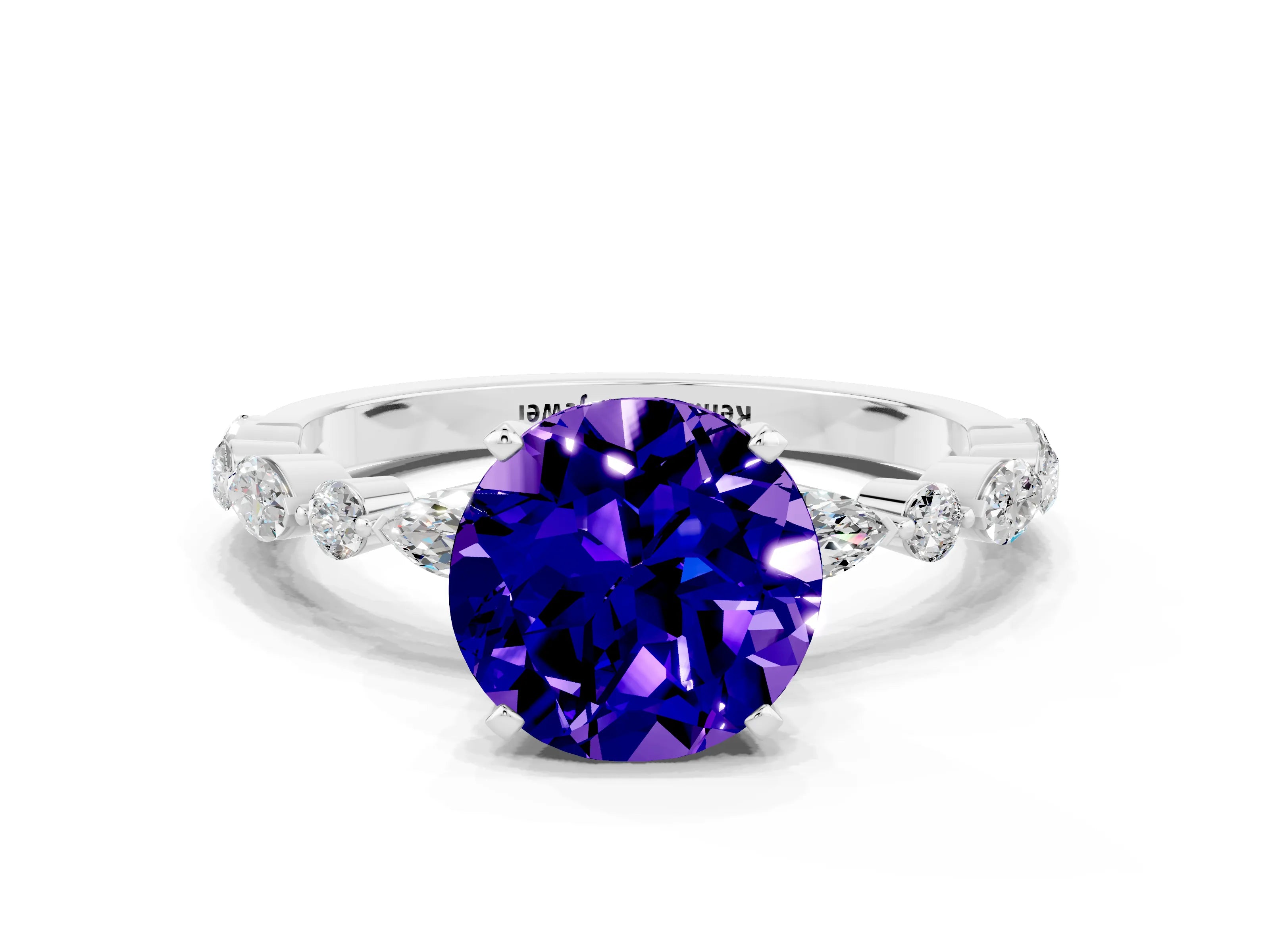White gold Round Cut Tanzanite Solitaire with Side Stones on a Pavé Band and Four-Prong Setting