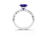 White gold Round Cut Tanzanite Solitaire with Side Stones on a Pavé Band and Four-Prong Setting_3