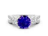 White gold Round Cut Tanzanite Three-Stone Ring with Pavé Split Shank and Four-Prong Setting