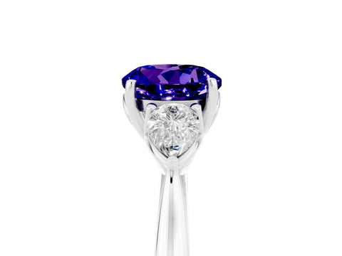 White gold Round Cut Tanzanite Three-Stone Ring with Pear Side Stones and Four-Prong Setting_17