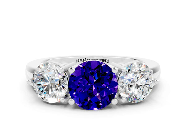 Platinum Round Cut Tanzanite Three-Stone Ring with Prong Setting and Classic Band