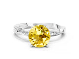 White gold Round Cut Yellow Sapphire Engagement Ring with Side Stone Accents and Four-Prong Setting_51