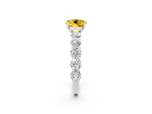 Platinum Round Cut Yellow Sapphire Prong Setting with Side Stones on a Pave Band