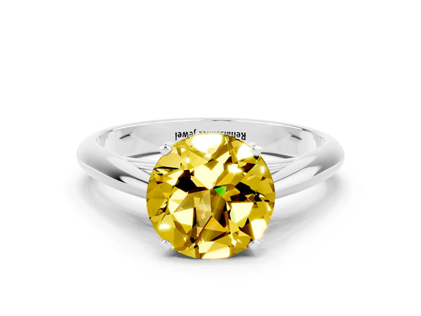 White gold Round Cut Yellow Sapphire Solitaire Engagement Ring with Cathedral Setting and Four-Prong Mount